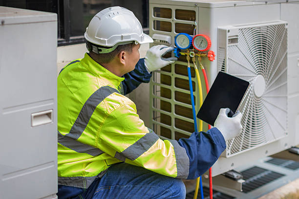Professional Air Conditioning Repair technician working in Quaker Street, NY